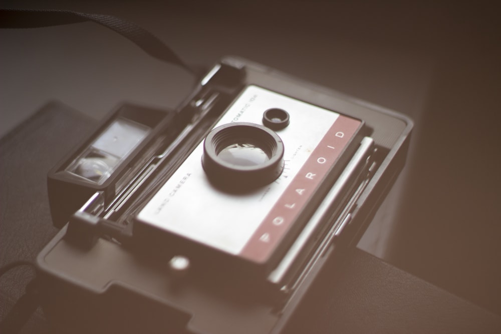 Polaroid instant camera on box
