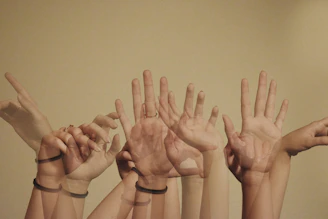 Close-up of hands in a motivating high-five after a fitness dance routine