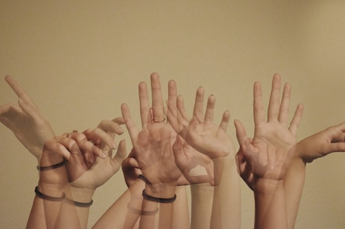 Close-up of hands expressing motion and emotion through dance gestures.