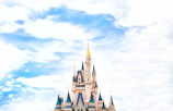 A bright, cheerful drawing of a whimsical storybook castle in a fantasy land.