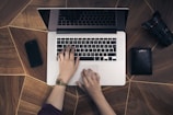 person using MacBook Pro