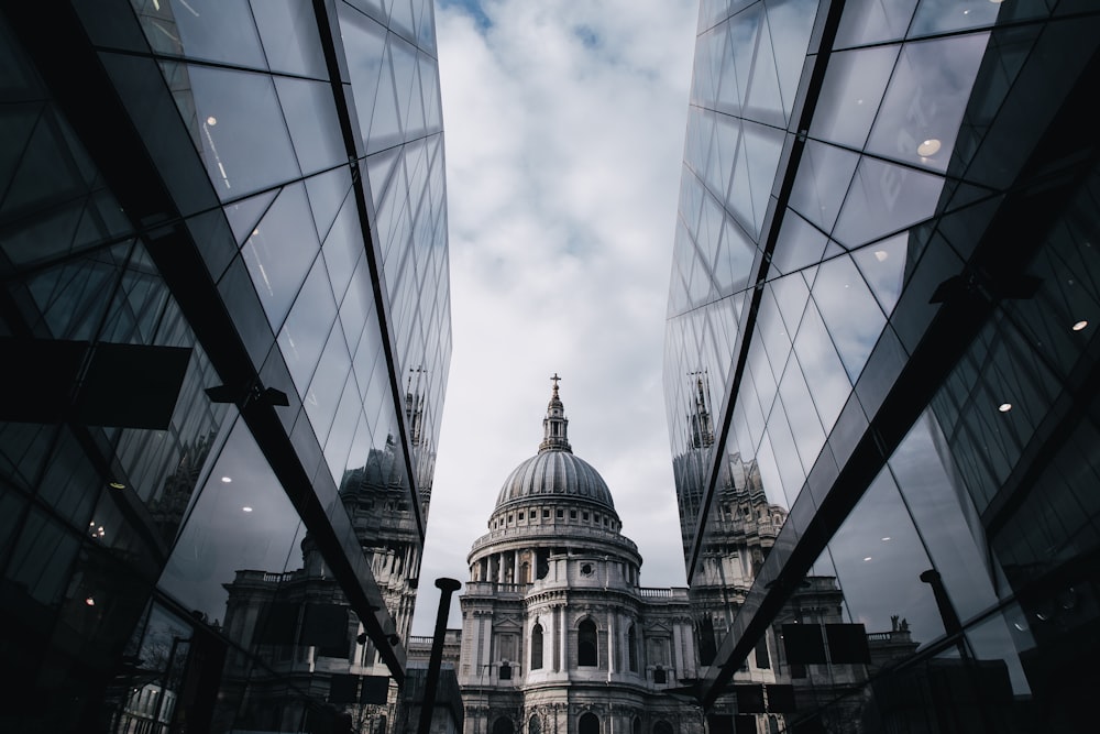 church between mirror-curtain buildings