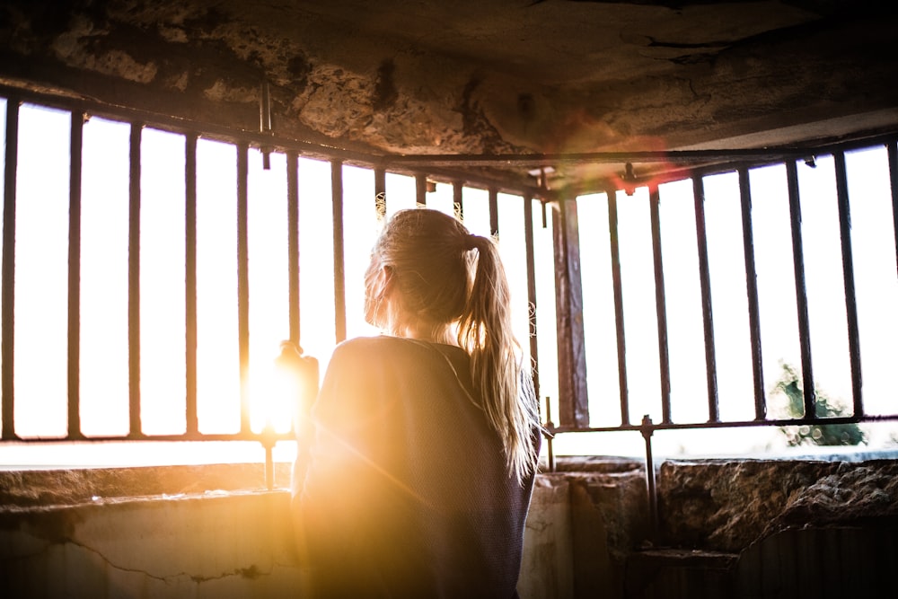 woman behind the bars