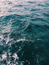 Refreshing aqua and blue waves blending into a splash of hydration.