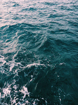 Refreshing aqua and blue waves blending into a splash of hydration.