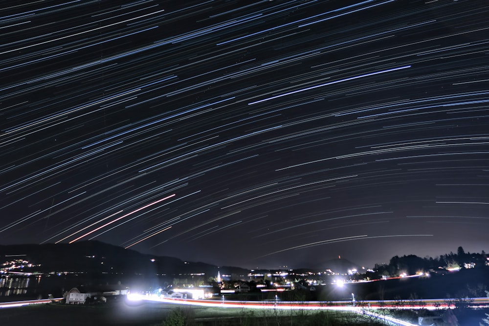 time lapse photography of city lights during night time