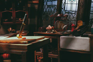 Rustic kitchen scene featuring a thick wooden cutting board with a smooth epoxy resin accent, surrounded by fresh vegetables
