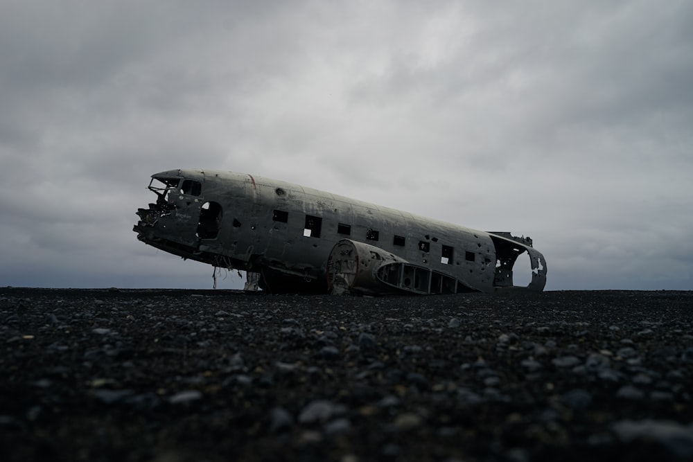 white plane on gray surface