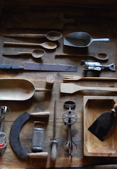 A collection of vintage kitchenware displayed on a rustic table.