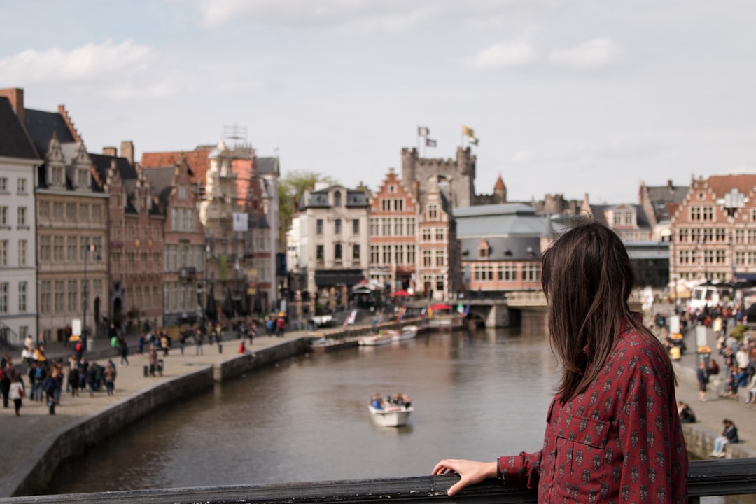 woman standing on bridge,