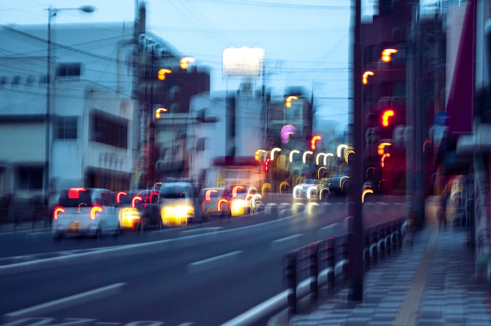 a blurry photo of a city street at night