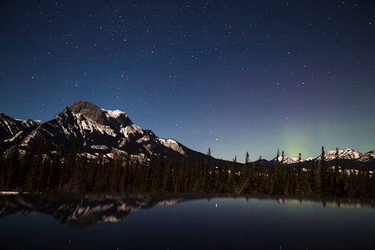 mountain near body of water in Jasper National Park Canada