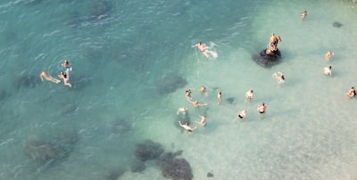 group of people swimming on body of water amalfi coast zoom background