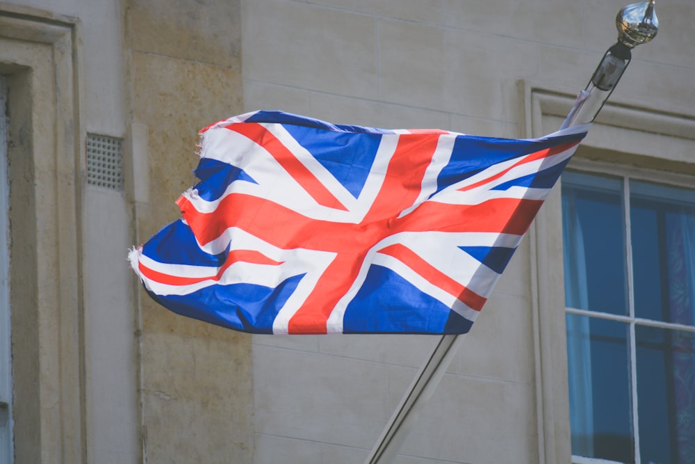 raised United Kingdom flag