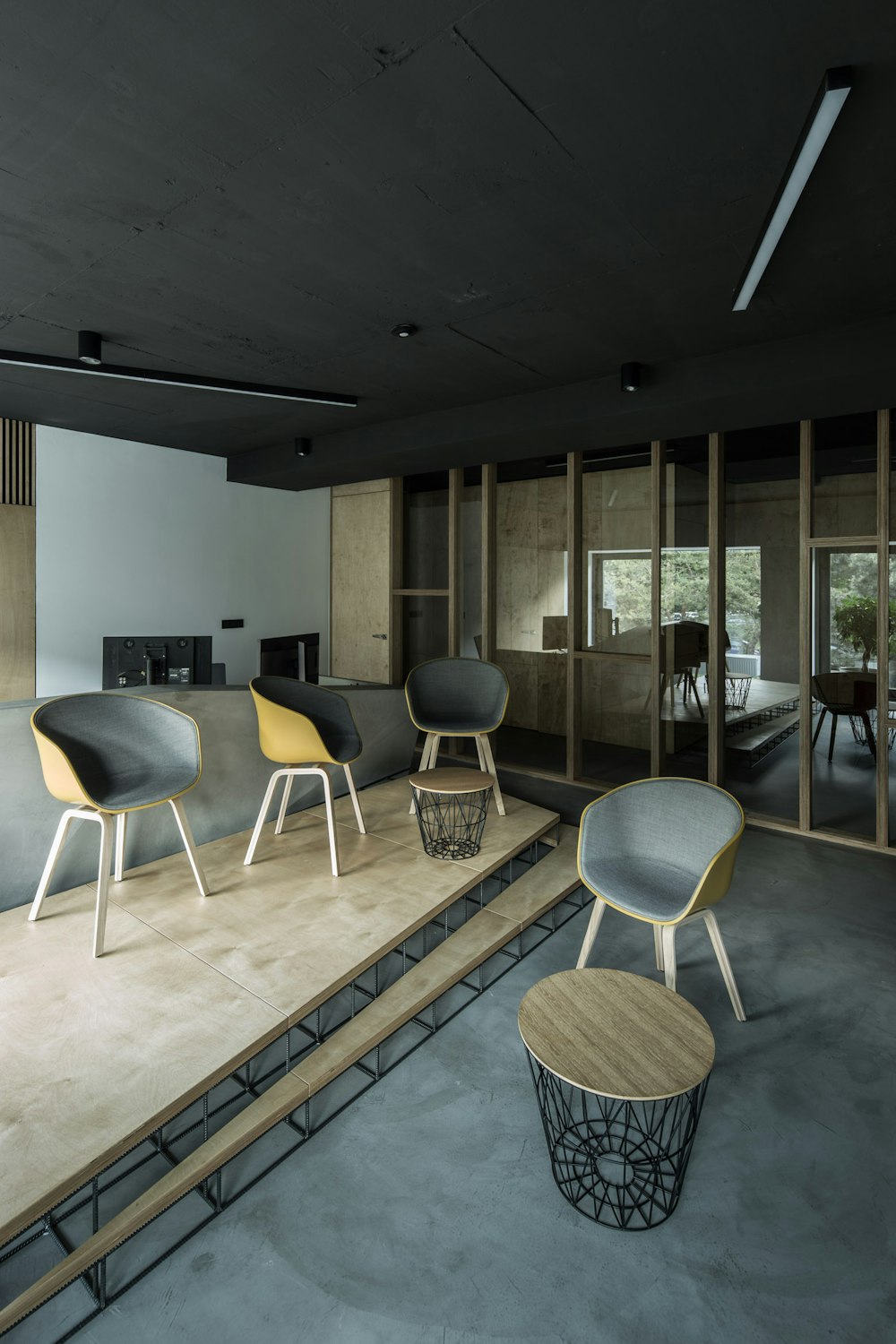 four brown wooden chairs inside house