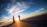 A couple enjoying a sunset on a pristine beach, smiling and holding hands.
