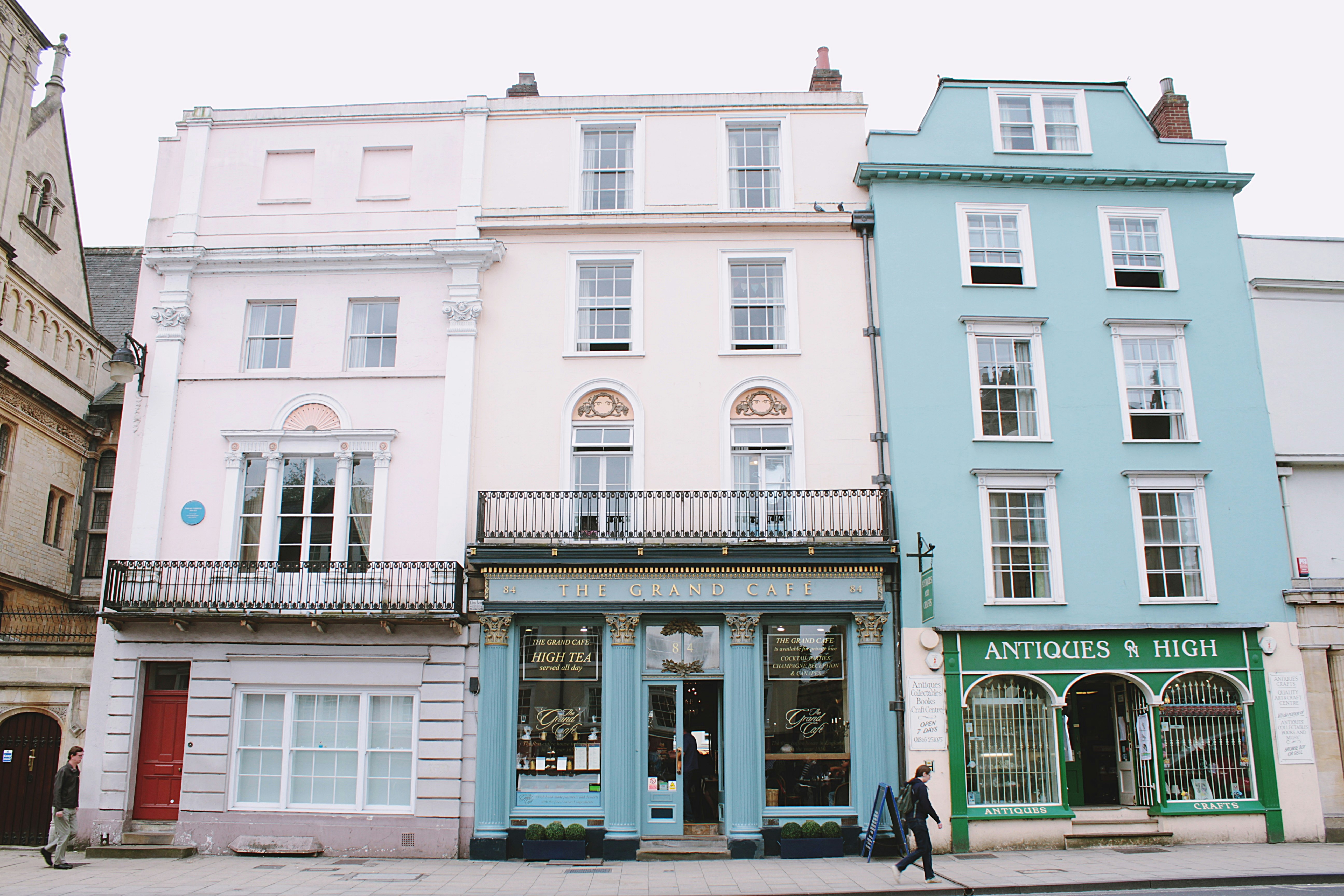 white and blue 4-storey house