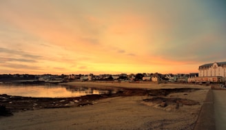 A serene Asian coastal town at sunset, symbolizing peaceful retirement.
