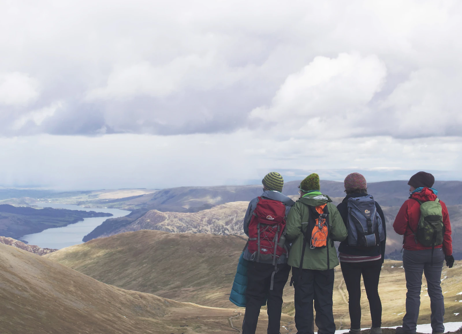 Tour group overlooking a mountain valley