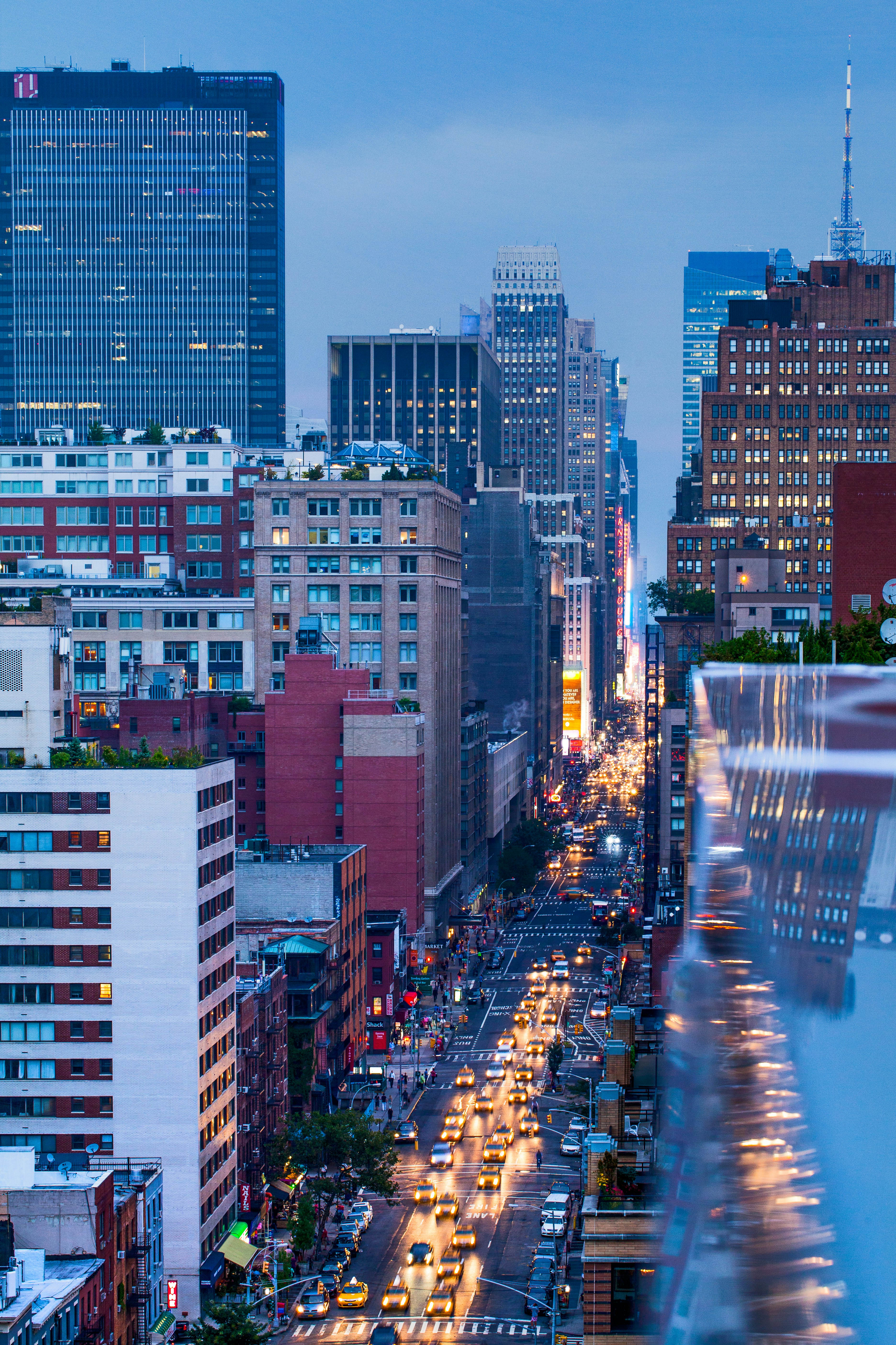 Skyscrapers busy road night