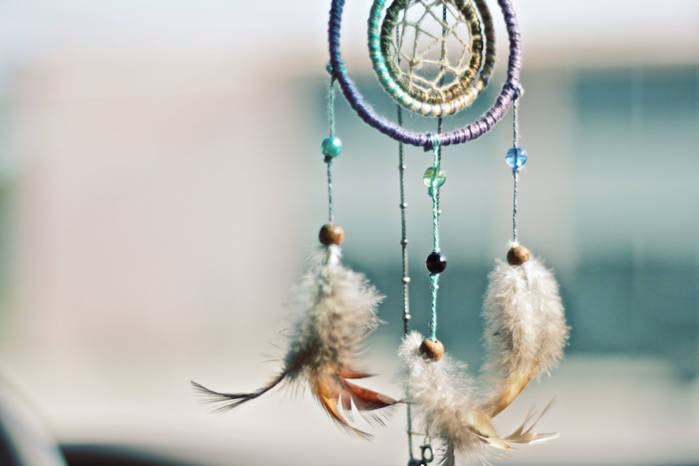 selective focus photography of multicolored dream catcher