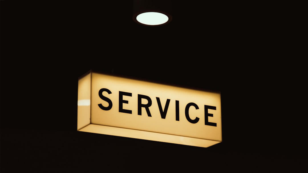 A “service” sign in a room lit up at night