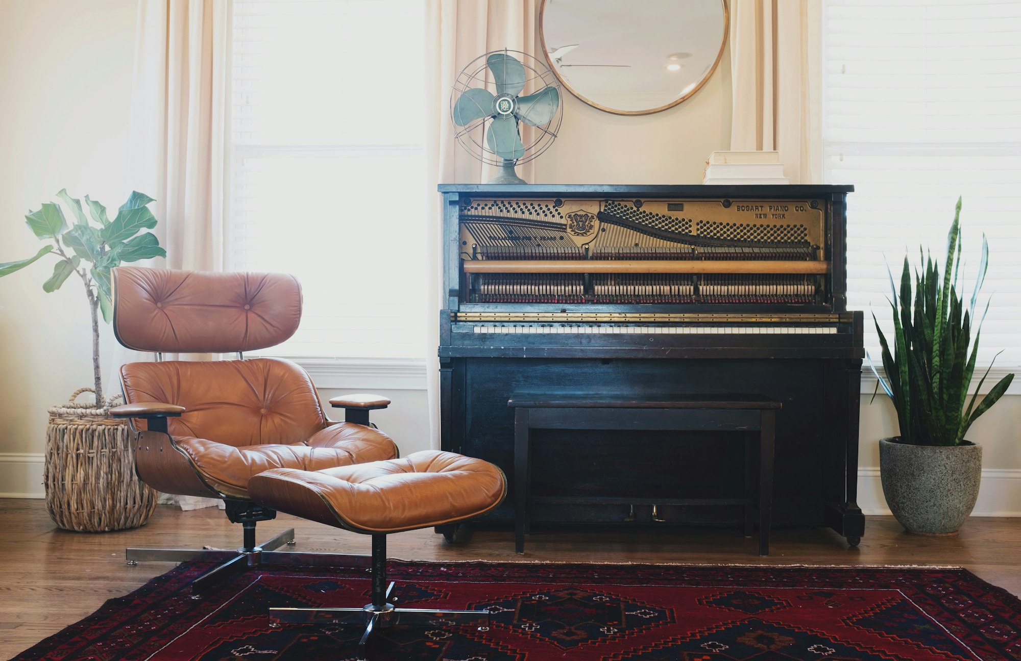 Cozy pianist’s room iconic Eames chair