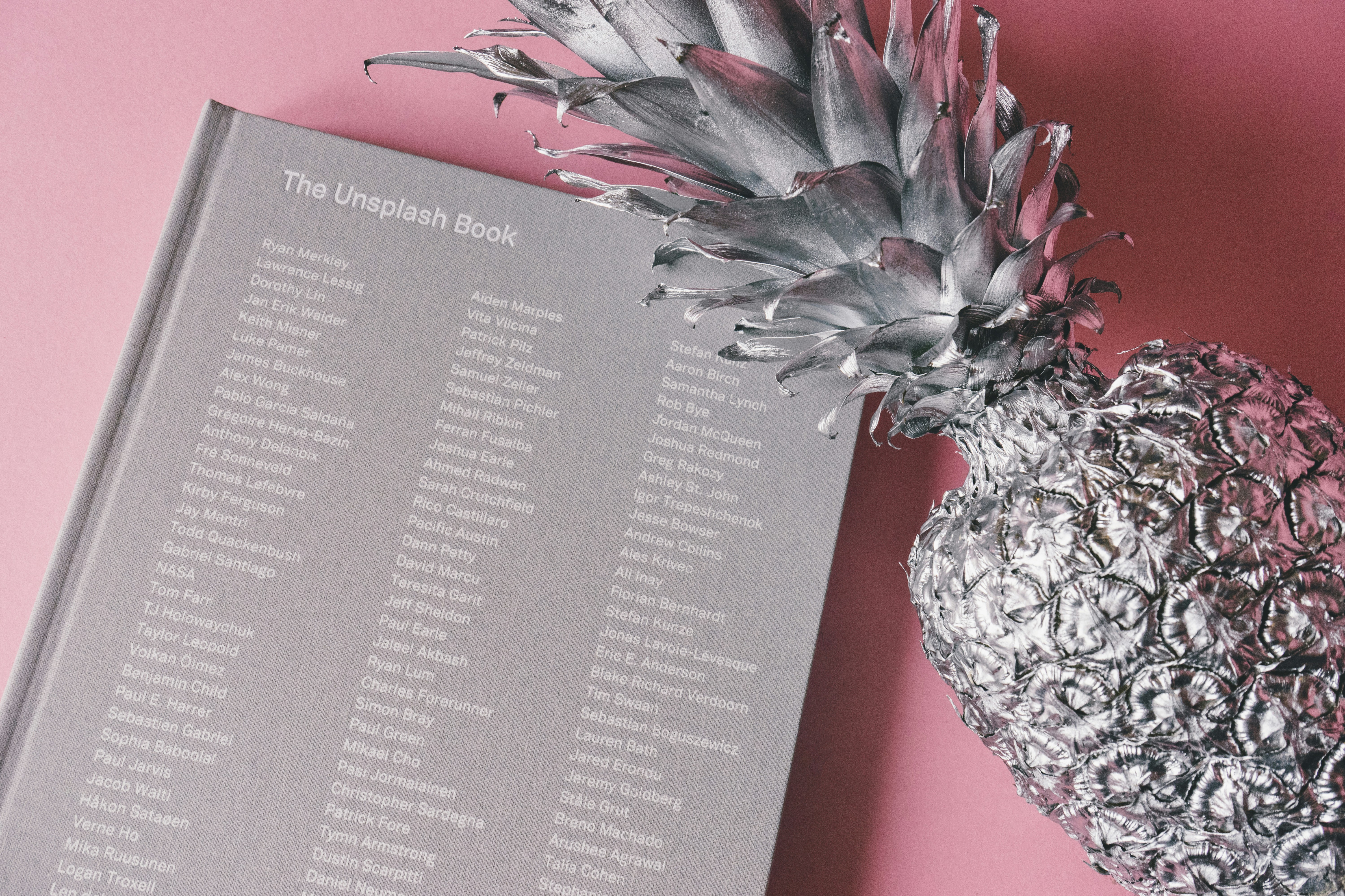 silver pineapple near the unsplash book knicks teams background
