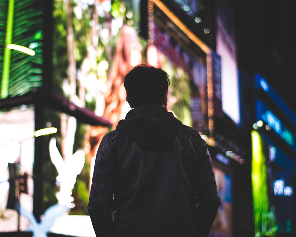 closeup photo of man wearing black hoodie jacket