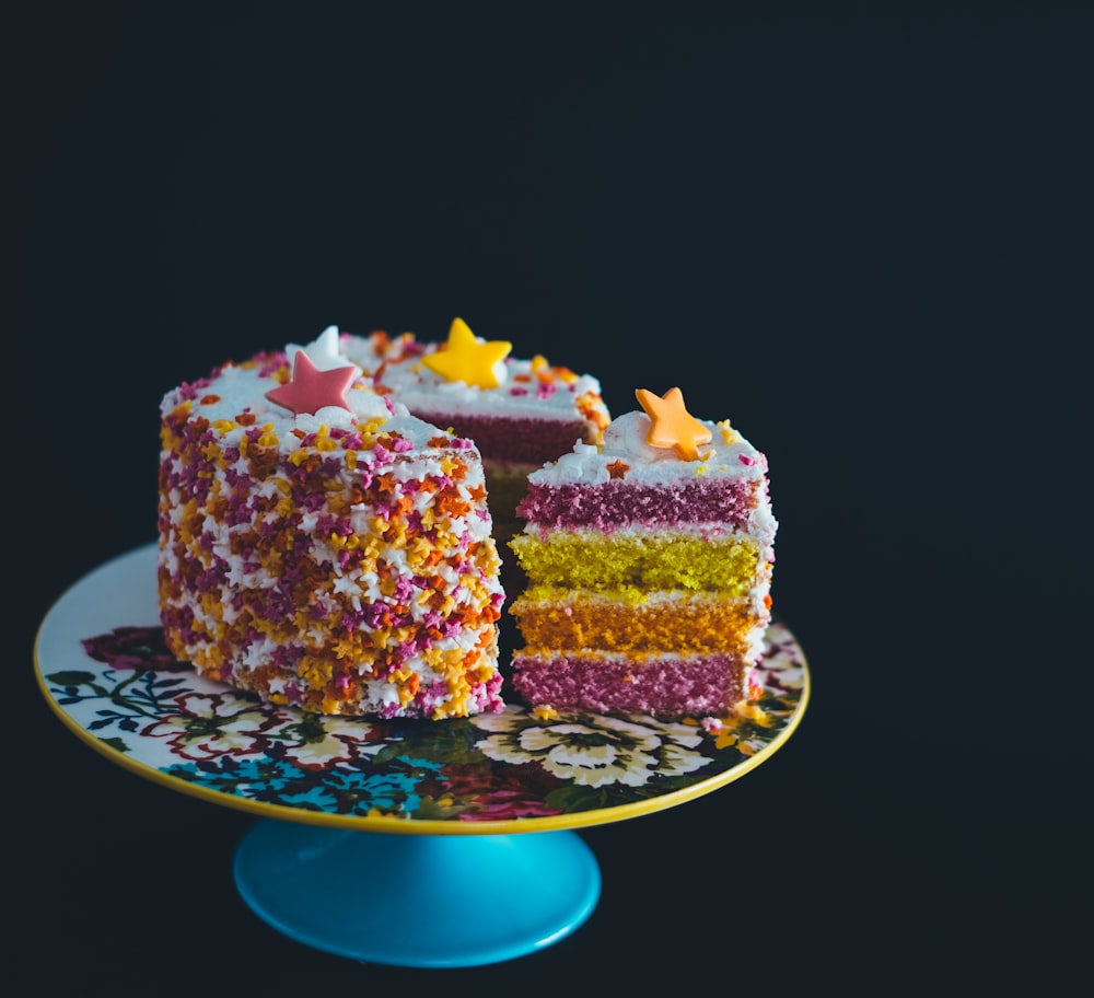 Colorful birthday cake with candy frosting stars