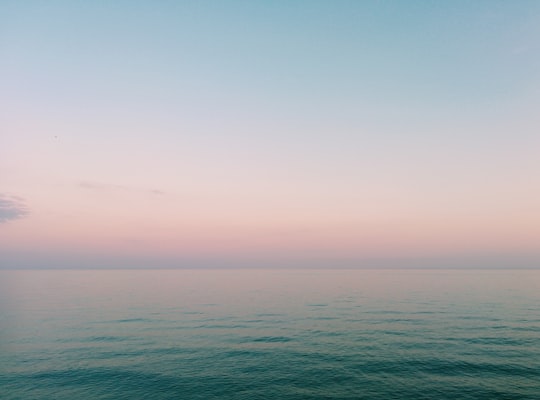 ocean during sunset in Centre Island Canada