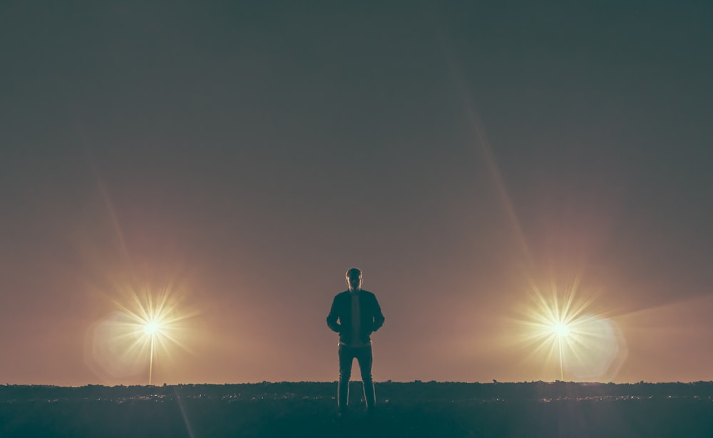 man standing in the middle of nowhere