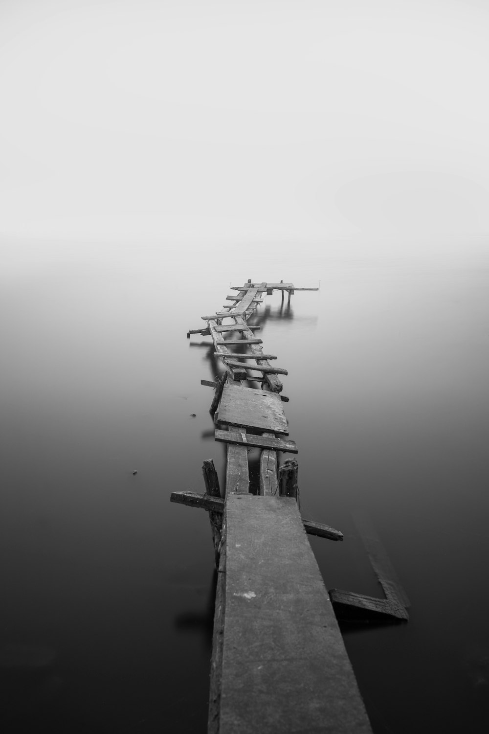 grayscale photo of dock