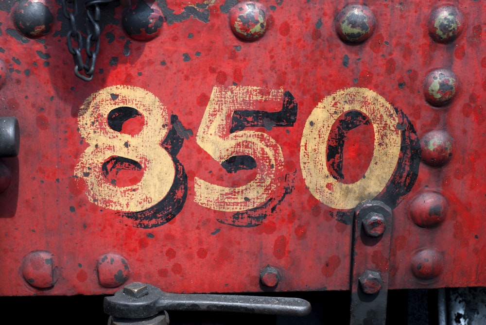 850-printed on red metal panel