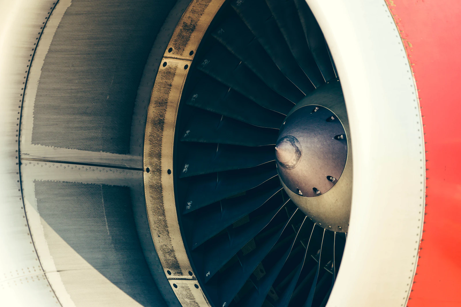 Close-up of a precision-machined turbine fan, used to illustrate aerospace component work.