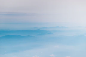 mountain covering with clouds
