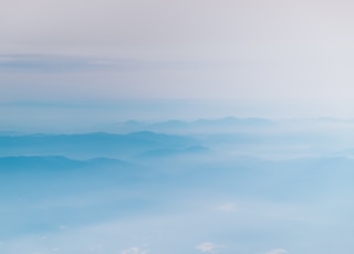 mountain covering with clouds