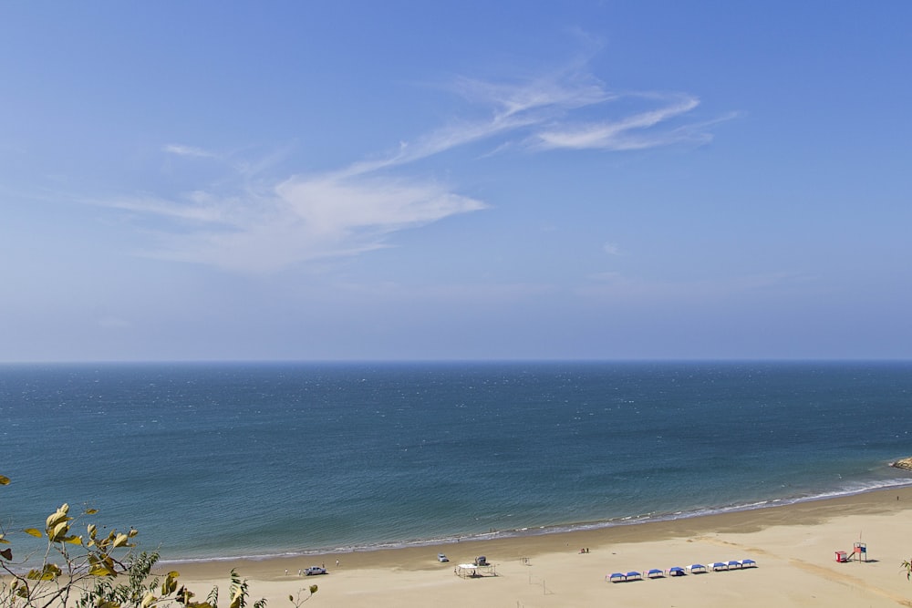 aerial photography of body of water and sand