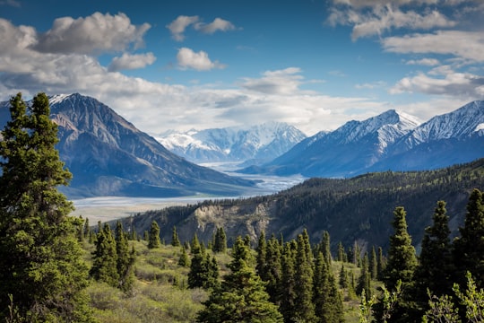 green mountain across body of water in Kluane National Park and Reserve Canada