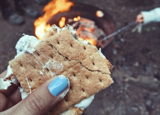 woman holding biscuit