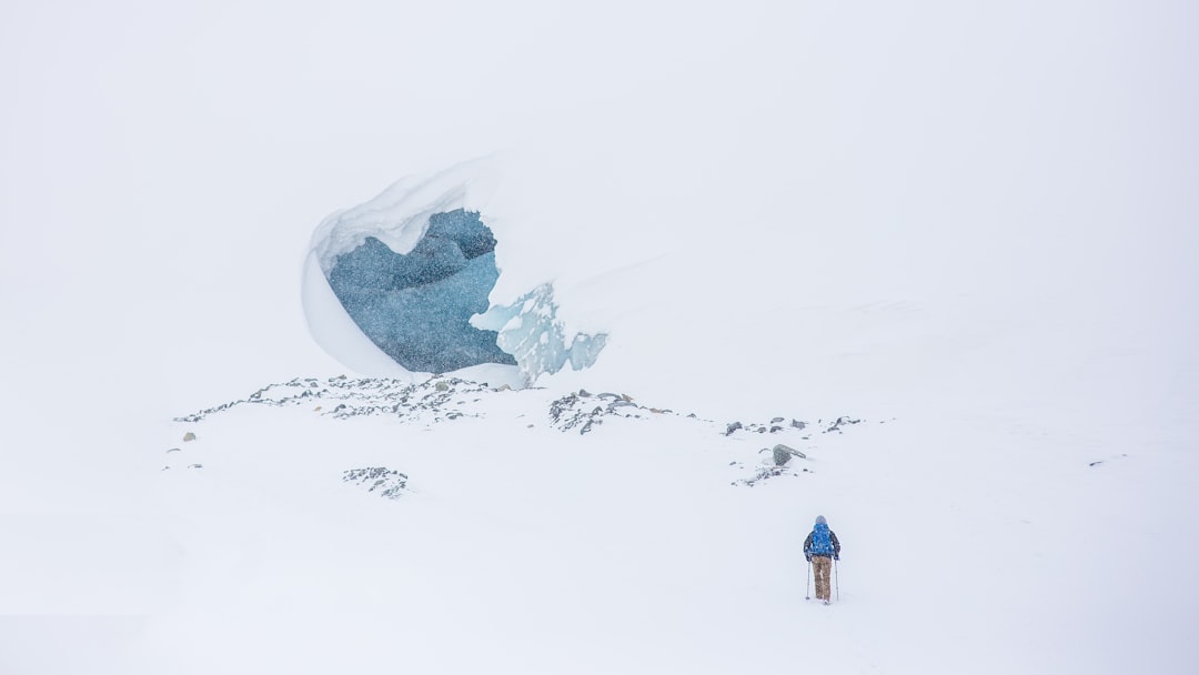 man skiing on mountain top