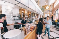 woman standing on food counter