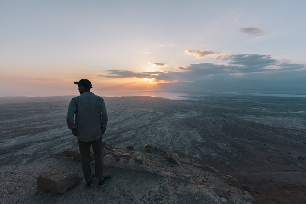 man looking at land