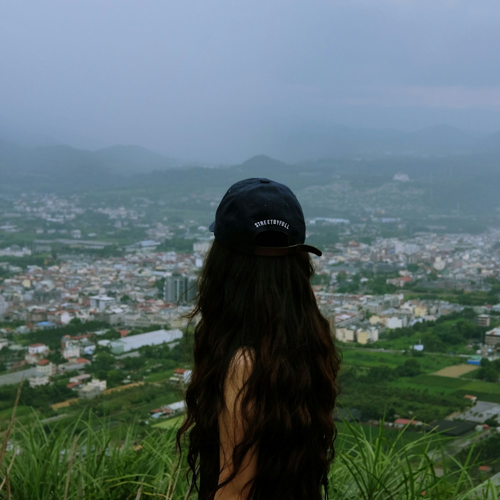 woman standing on mountain