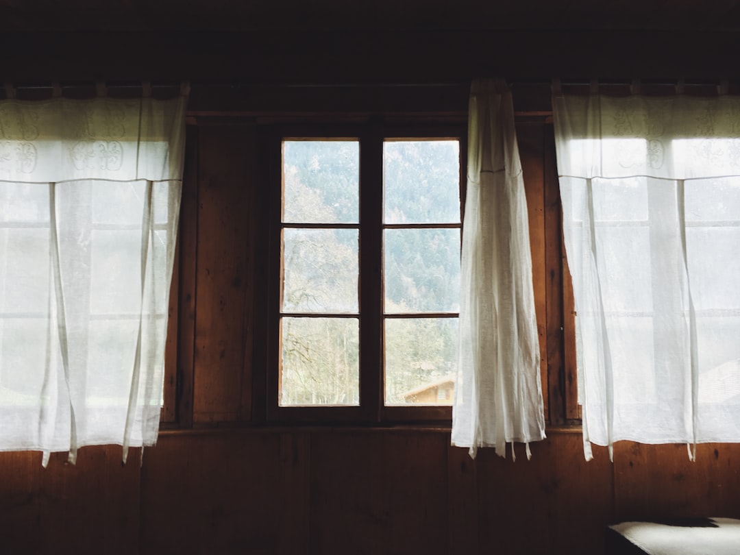 clear glass window with cutrain,