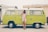 A woman in a floral dress is standing casually against a vintage lime green Volkswagen van. She is wearing sunglasses and sandals, with one hand resting on her head. The background includes a house with a light-colored facade.