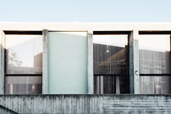 Commercial building facade with automated window shading system