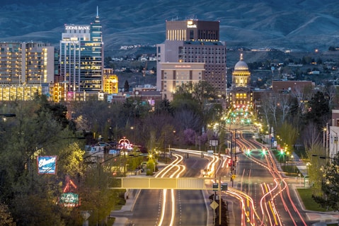gray, blue, and black concrete city buildings
