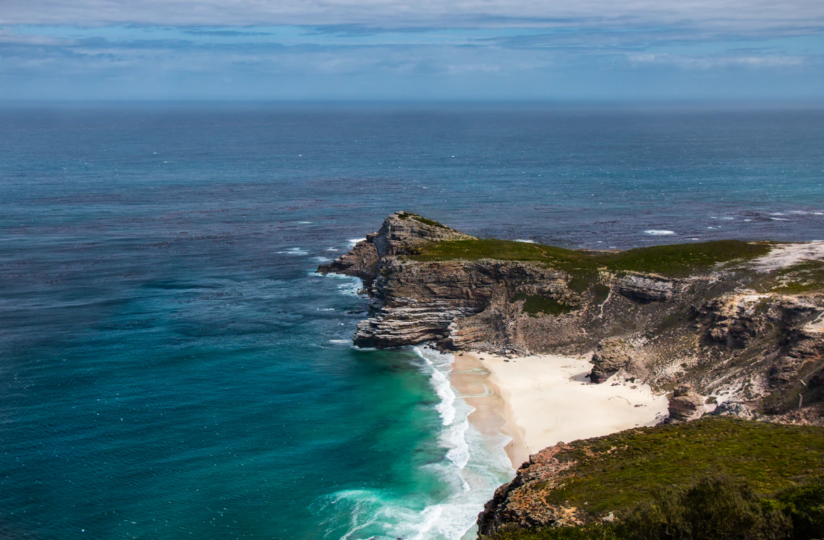 Rocky cliff at the Cape of Good Hope with Atlantic Ocean