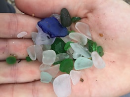 A close-up of colorful sea glass pieces arranged artistically.